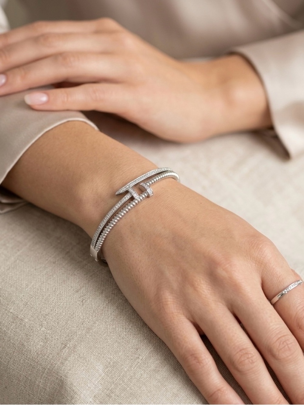 49: Cubiz Zirconia Pavé Silver Bypass Bracelet